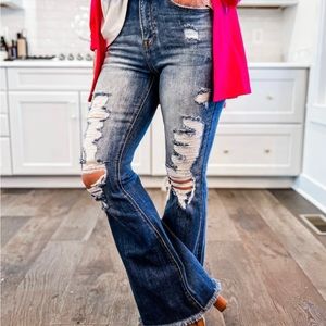 Risen medium wash high rise distressed flares